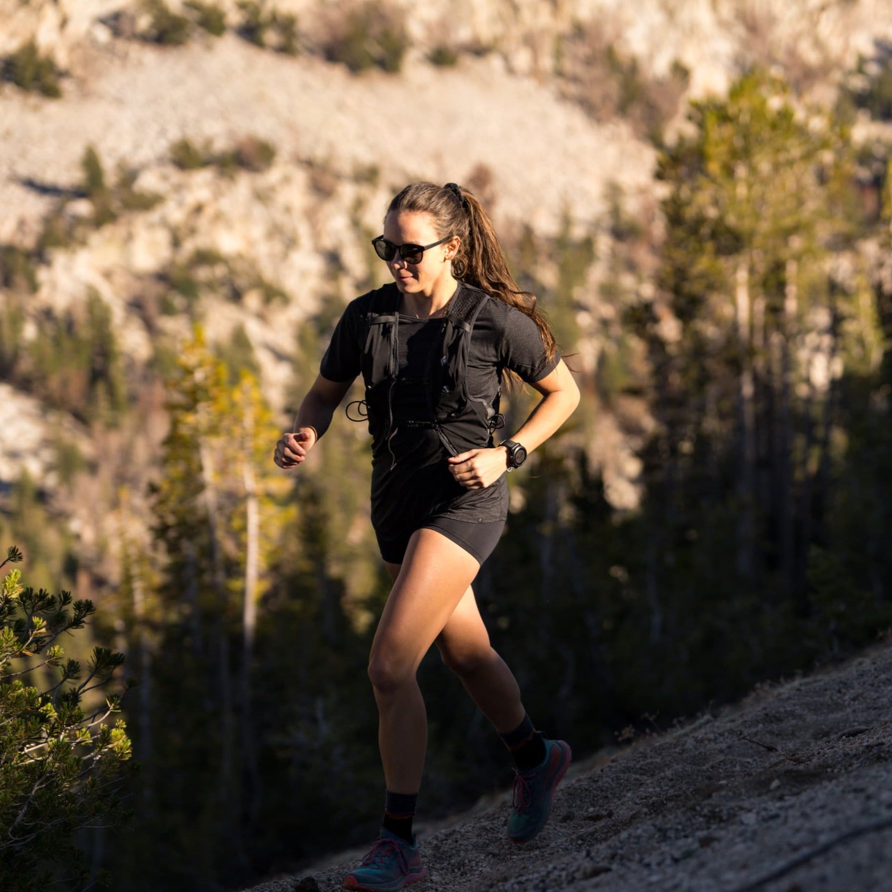 A woman goes for a trail run in Mammoth Lakes