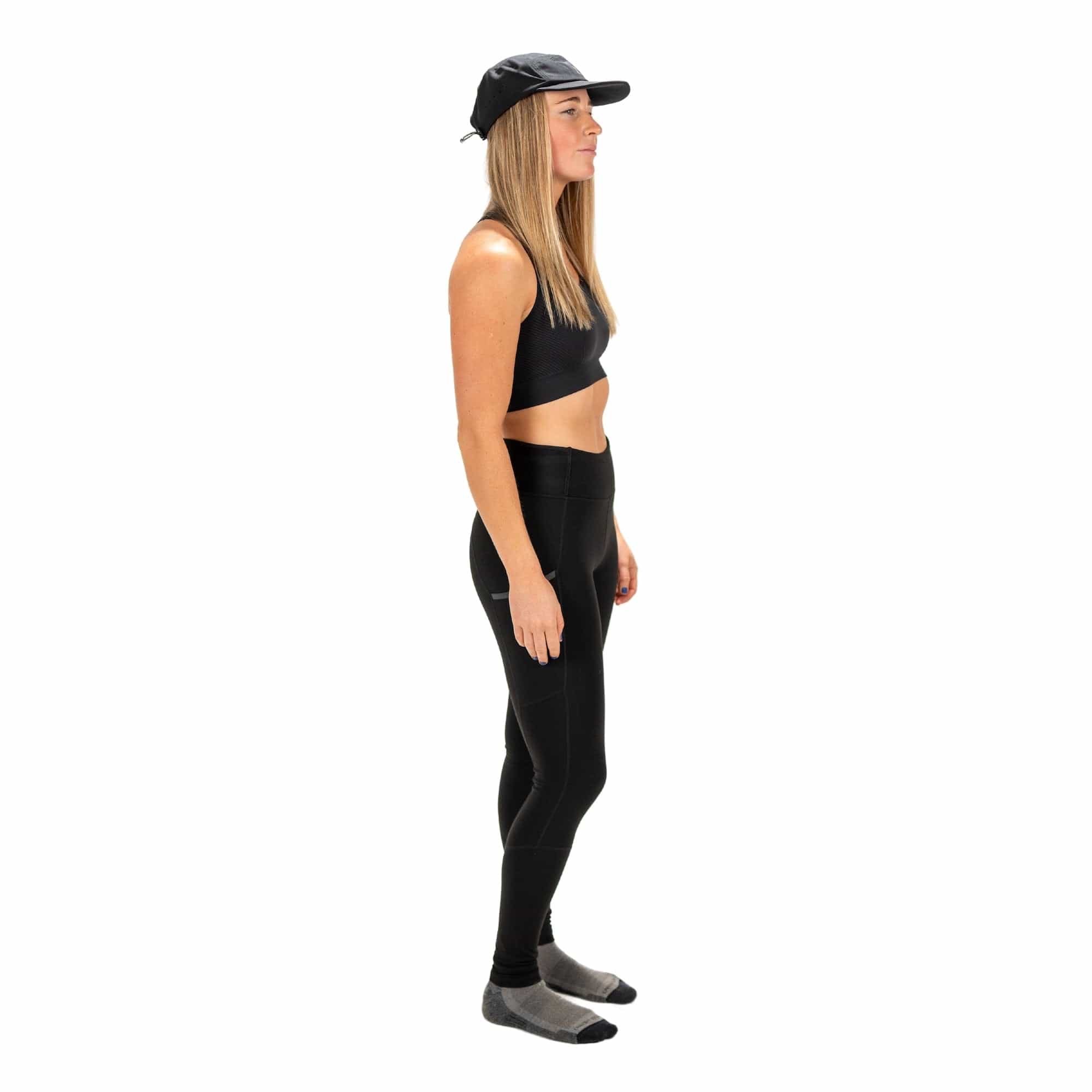 a woman wearing a Ridge Run Hat with a Ridge Send-It Sports Bra and Crowley Tights