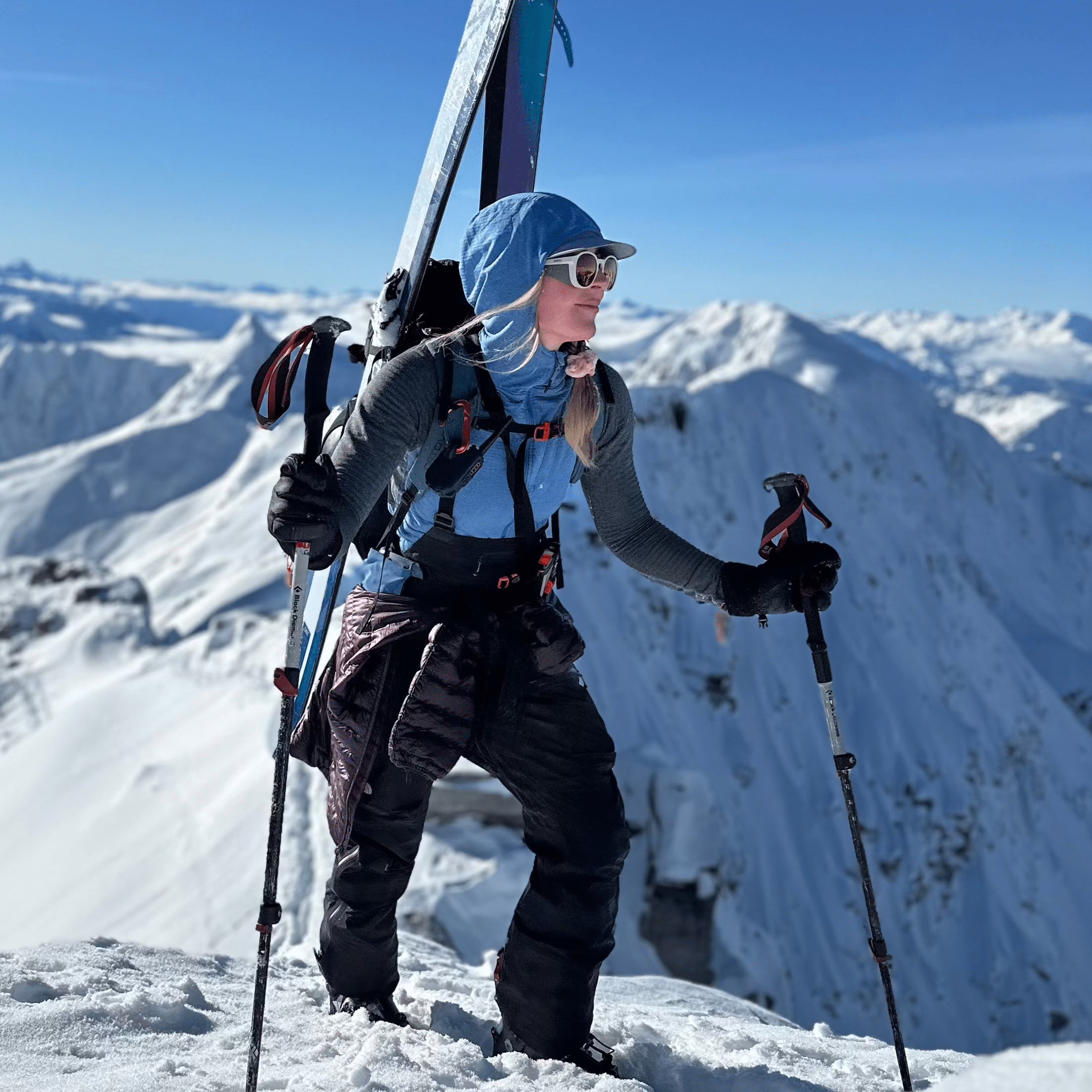 a woman backcountry skiing in Canada in a Convict Canyon Hoodie