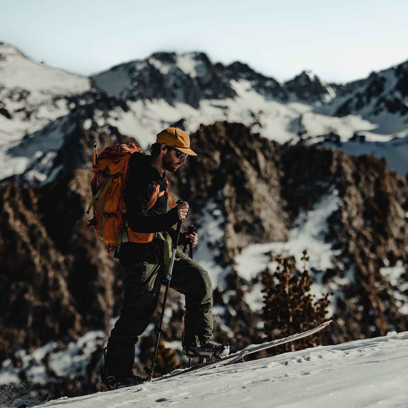 Paz Mendelevitch going uphill on a backcountry splitboard mission in the Mammoth Lakes Basin wearing Ridge layers