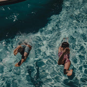 two people dive into a pool wearing Ridge Merino Wool Underwear