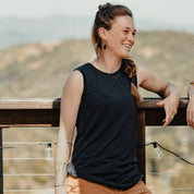 a woman laughing wearing a Natural Tencel Merino Wool Tank Top