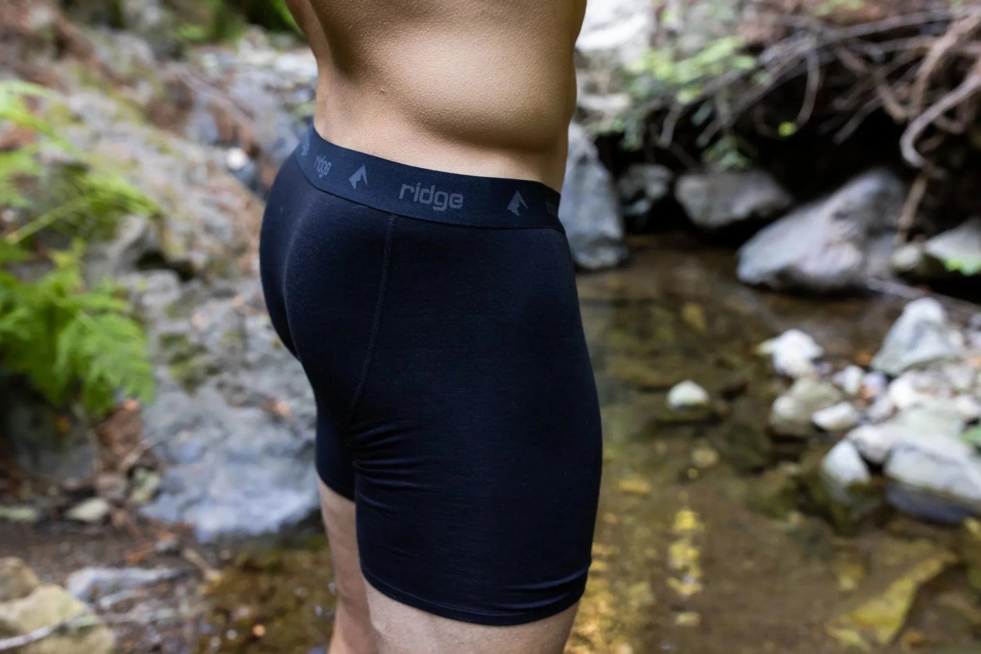 a close-up of a man wearing Ridge Merino boxer briefs