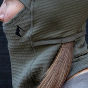 a closeup of the pigtail holes on the side of the Cloudripper Grid Fleece Balaclava