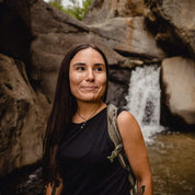 a woman hiking wearing a Natural Tencel Merino Wool Tank Top