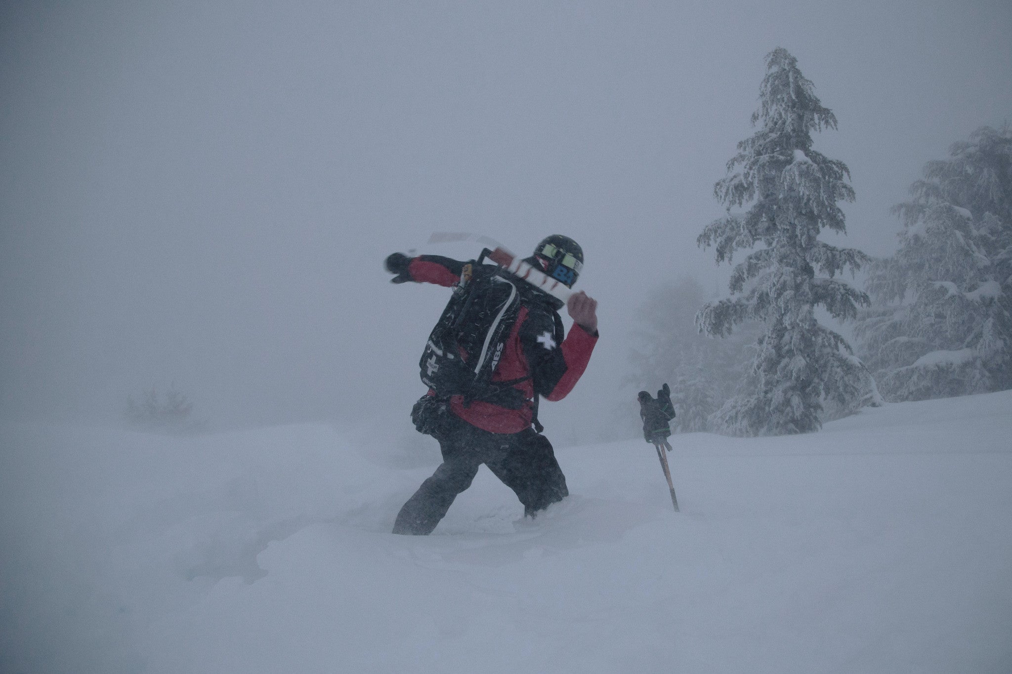 a ski patroller at Mammoth Mountain throwing an avalanche bomb