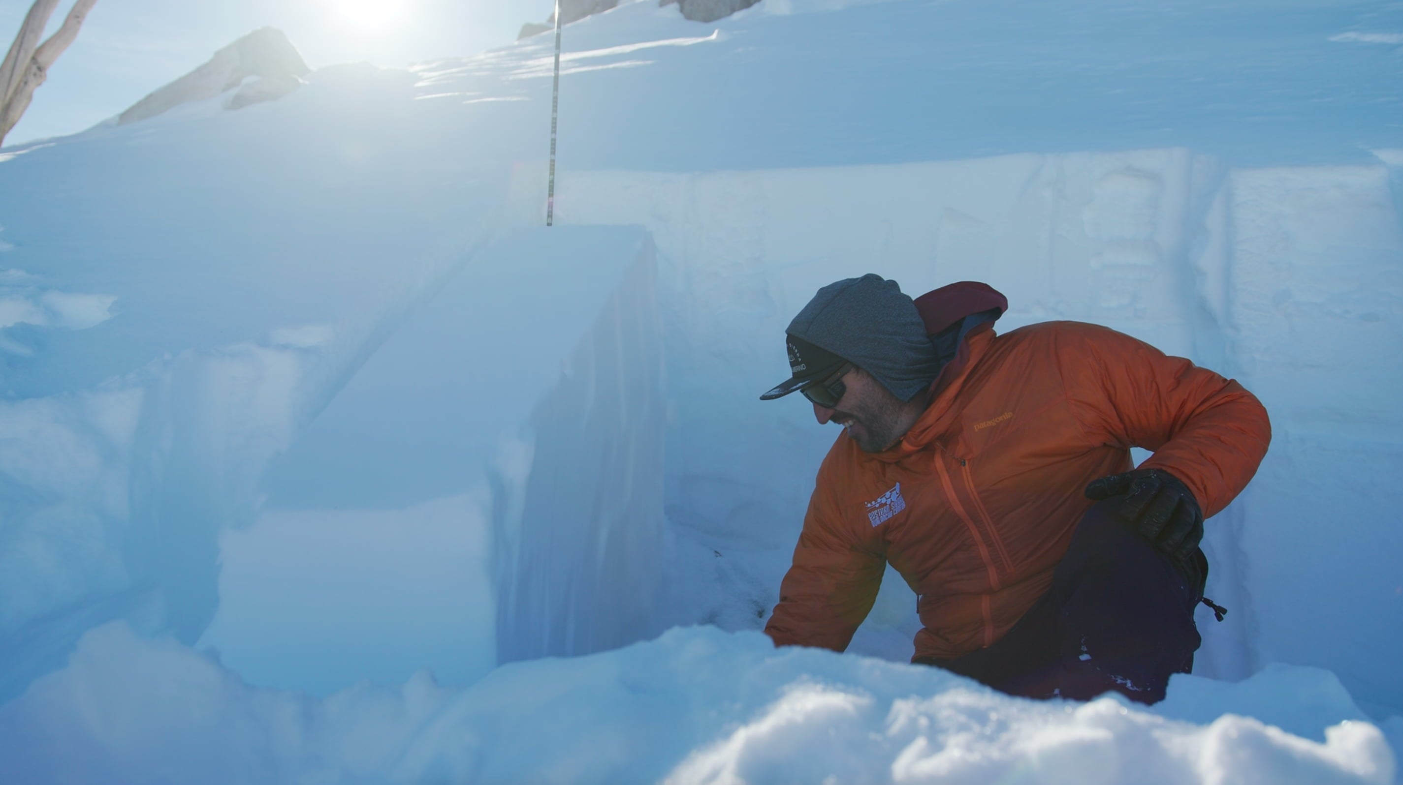 an Eastern Sierra Avalanche Center forecaster digging a snow pit