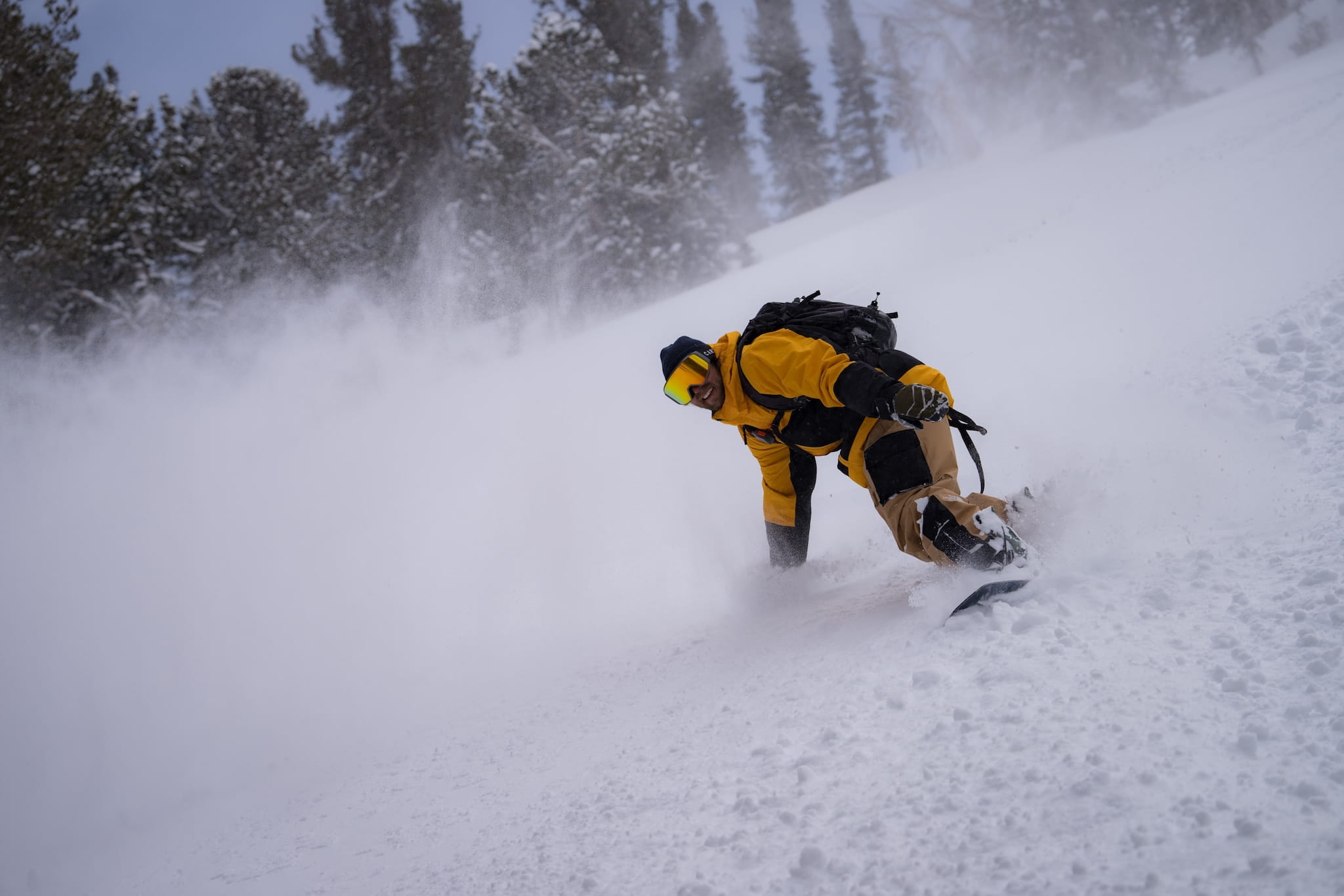 snowboarder Tim Humphreys cruises down a backcountry run