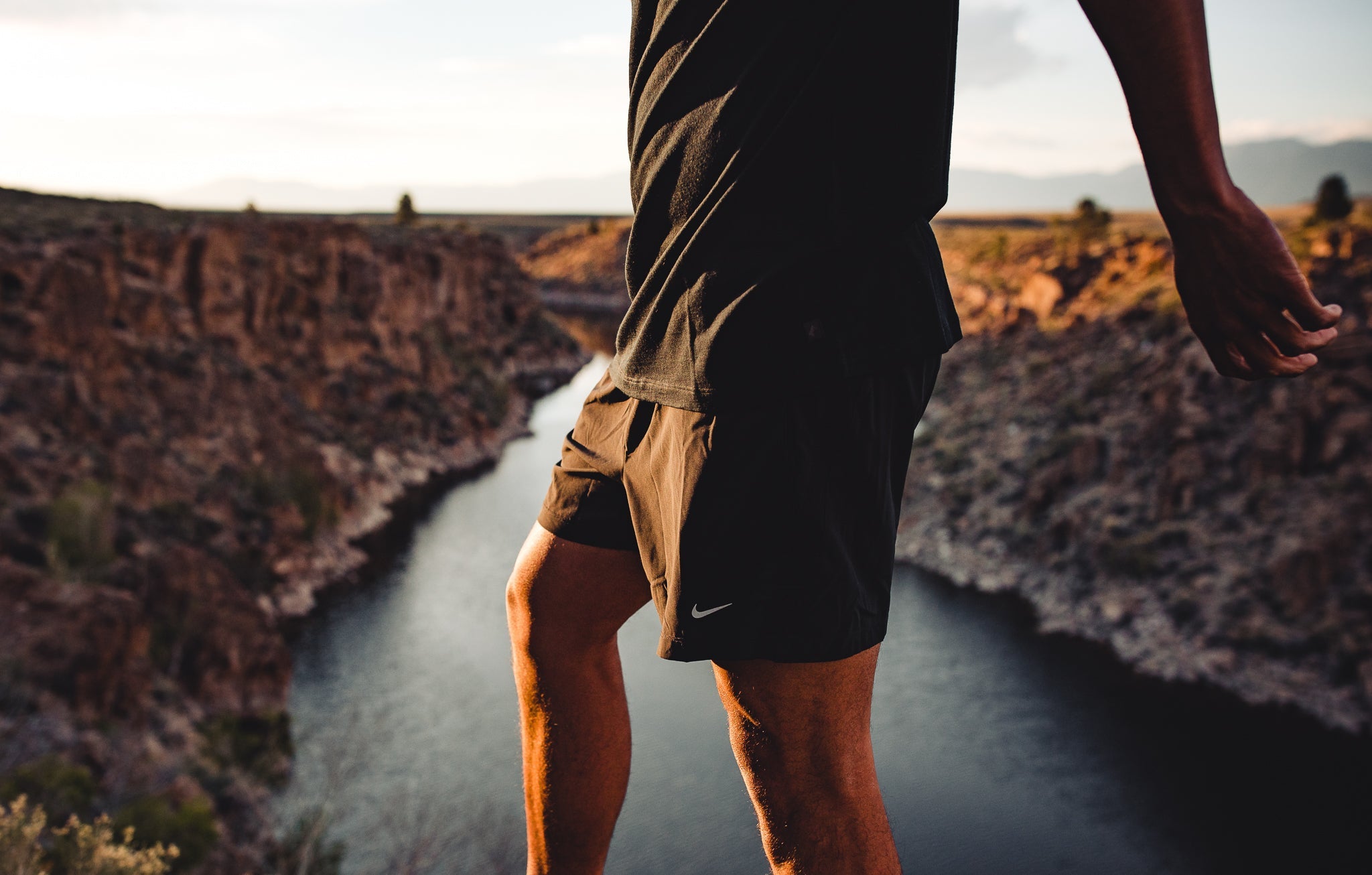 a closeup of a man wearing a Ridge Journey T-Shirt on a hike