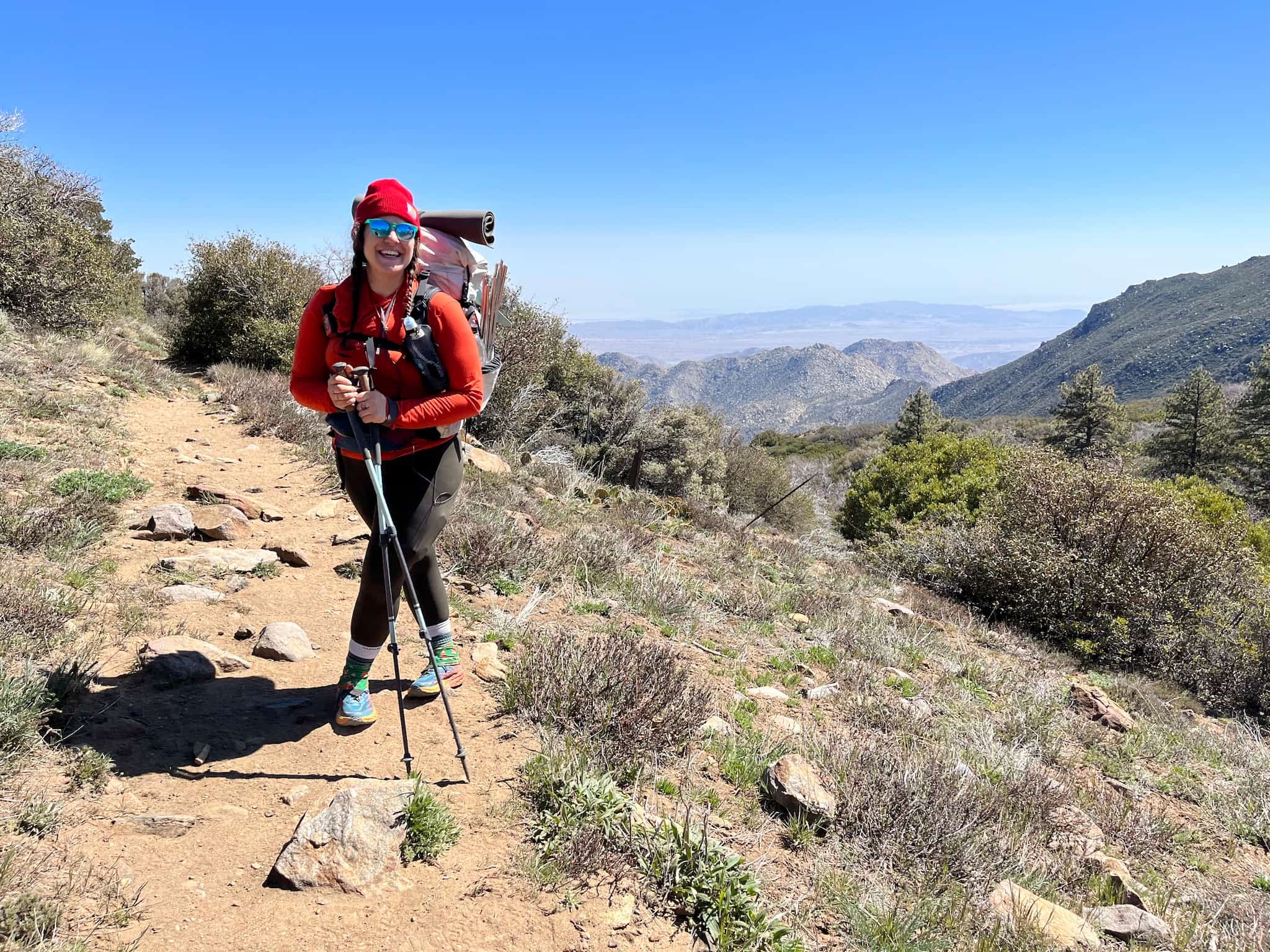 PCT hiker Laila poses for a picture on the trail