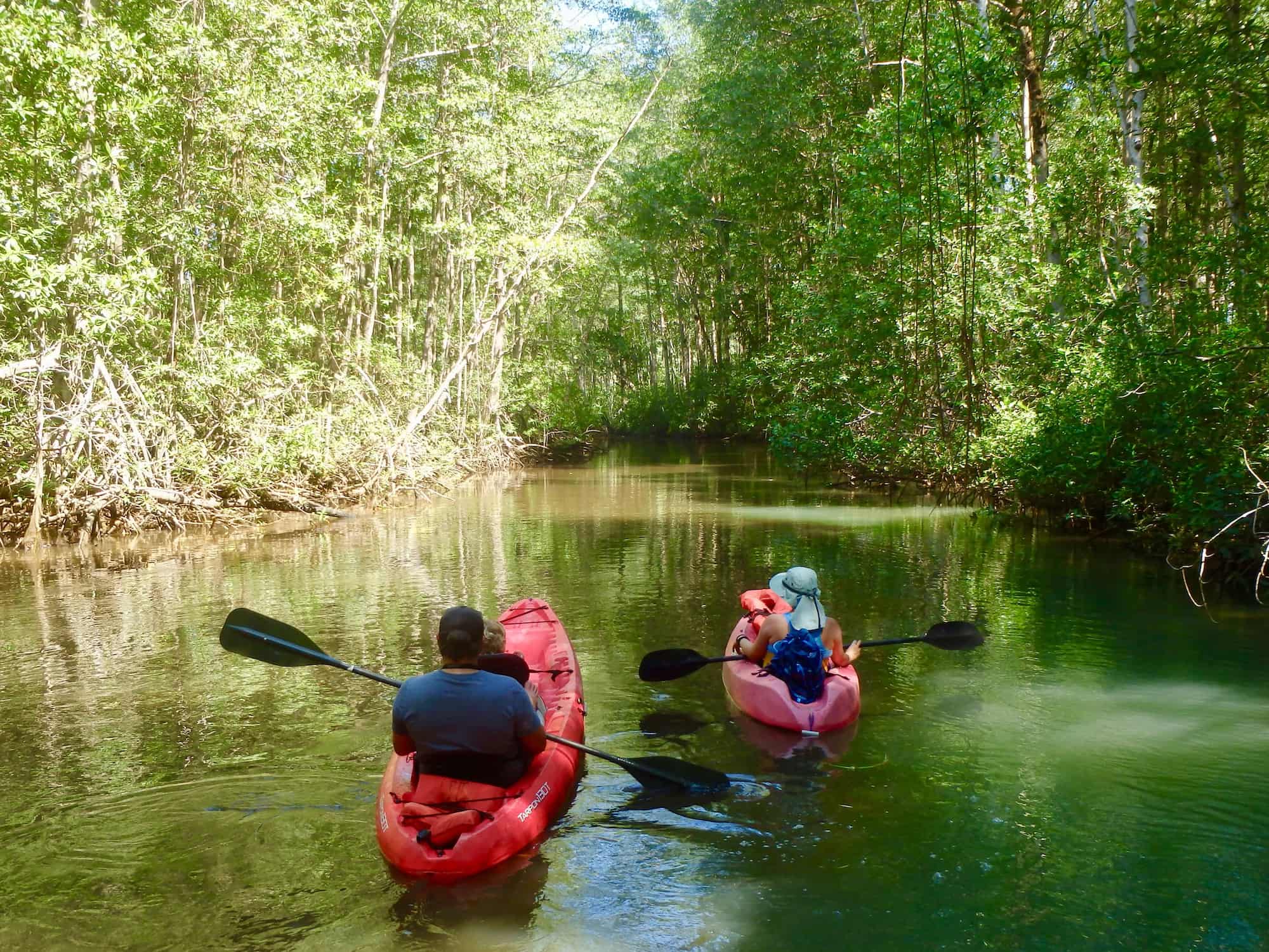river kayaking in Costa Rica wearing Ridge Merino summerweight layers