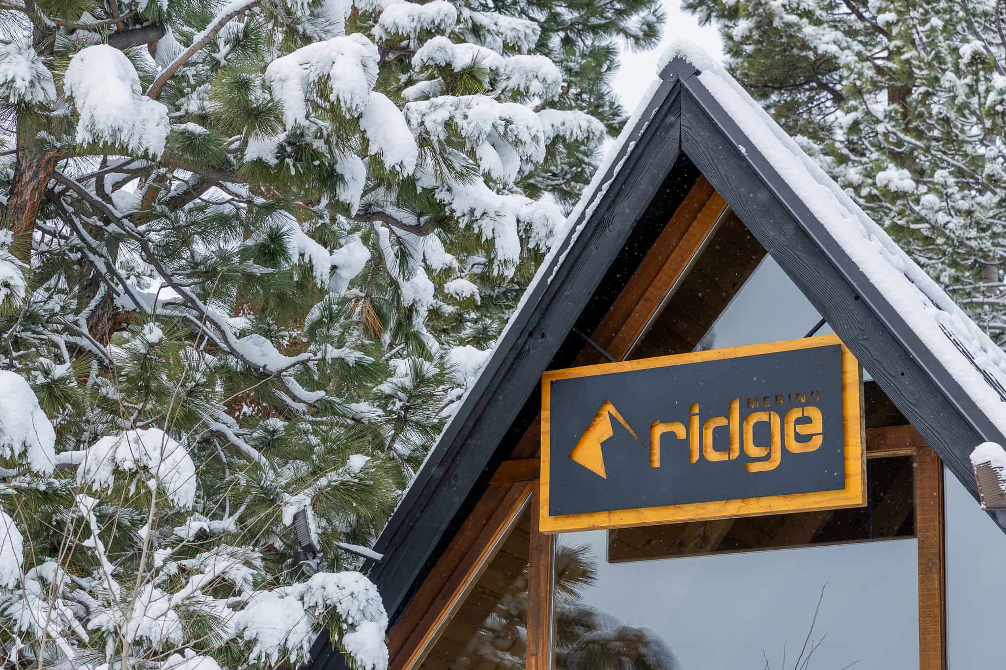the Ridge Merino storefront in Mammoth Lakes in a 1960s a-frame