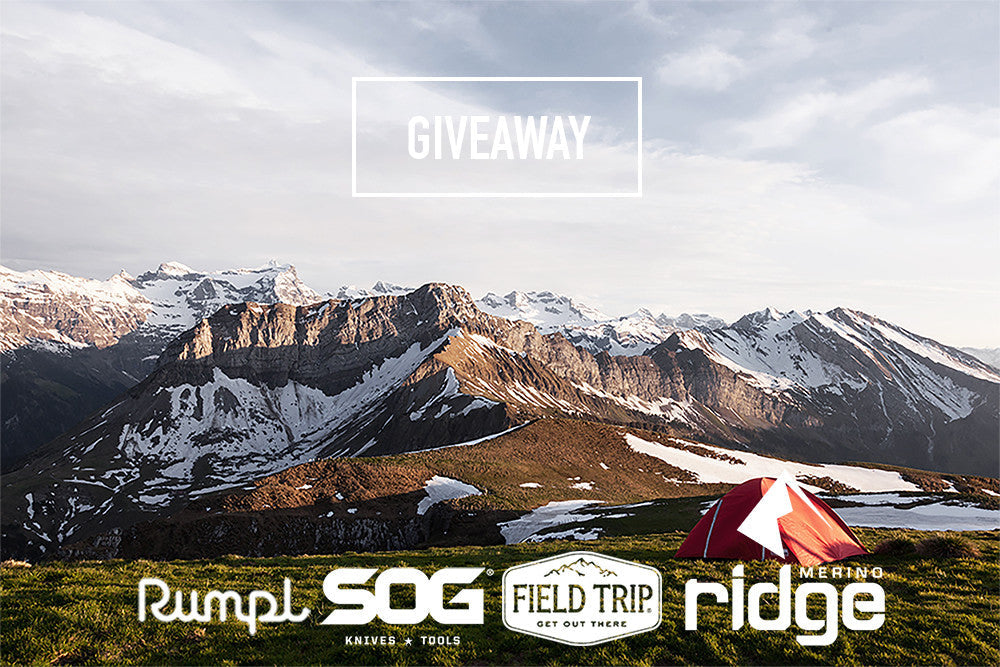 a scenic image of mountains with giveaway participants' logos over it