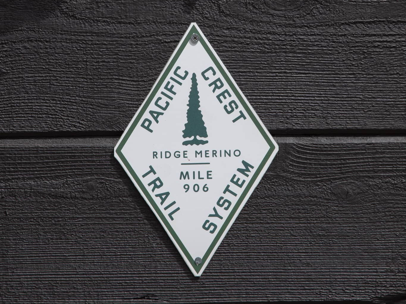 the Pacific Crest Trail System sign on the Ridge Merino a-frame headquarters
