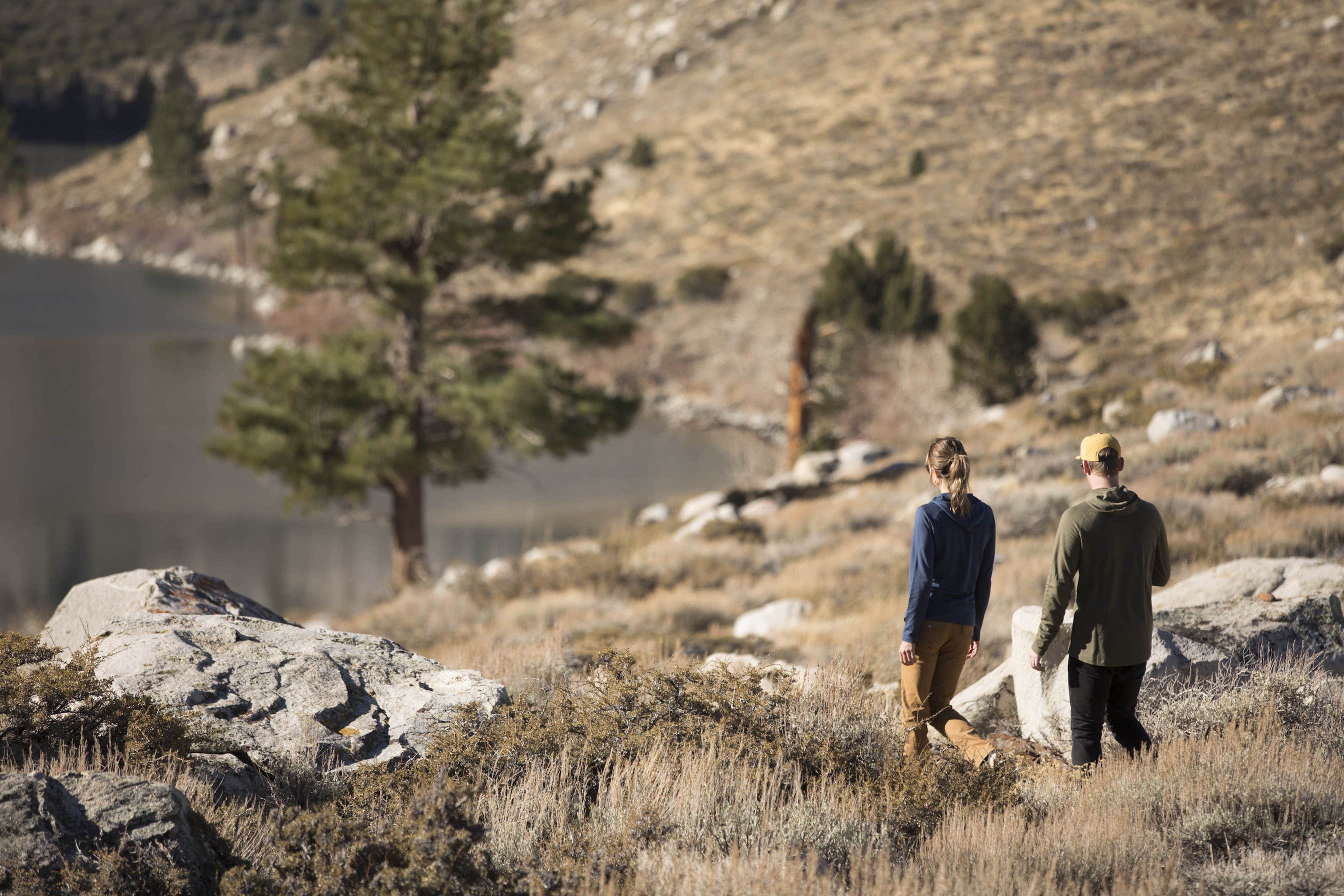 two hikers walking the trail around Convict Lake in Mammoth Lakes