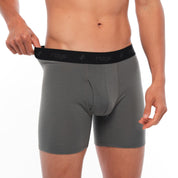 man showing the black waistband on the Gunmetal Boxer Briefs