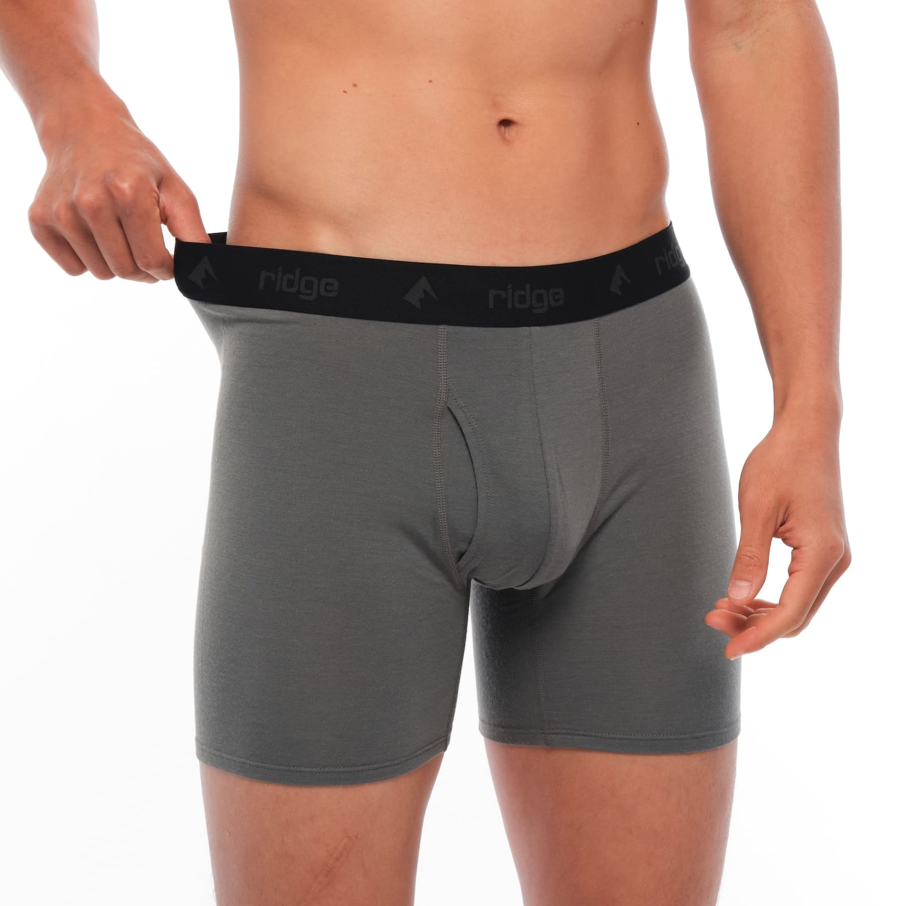 man showing the black waistband on the Gunmetal Boxer Briefs