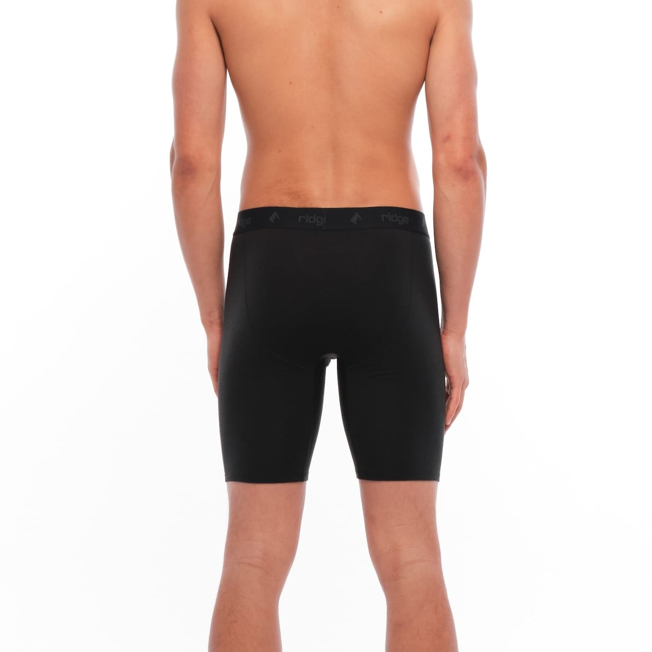 man wearing Black Long Merino Boxer Briefs from the back