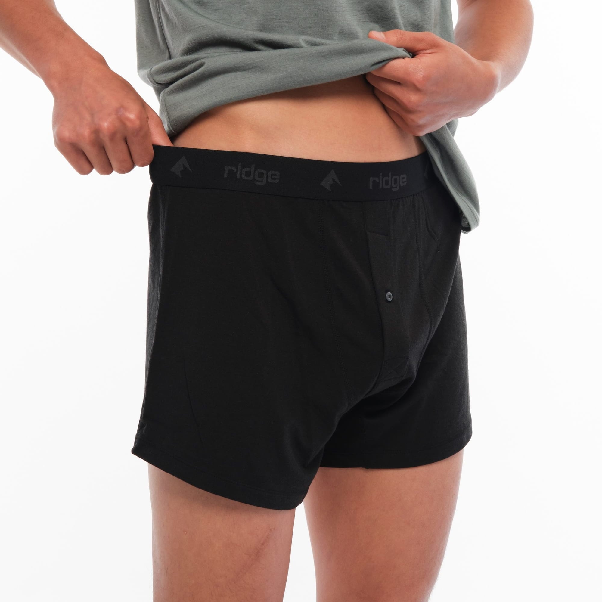 a man wearing black Ridge Merino Boxer Shorts