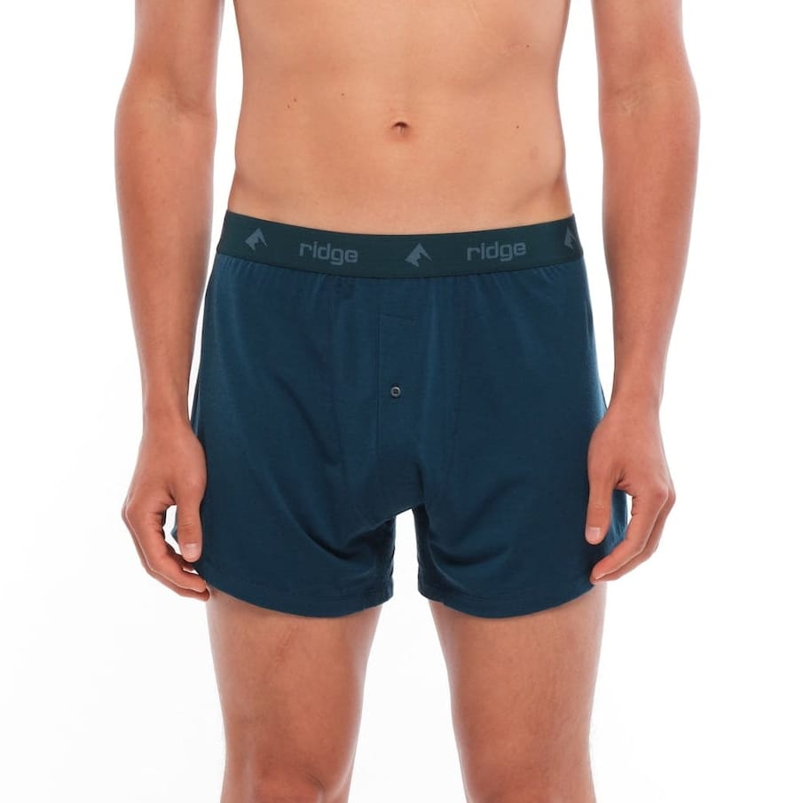 a man wearing Deep Current Men's Ridge Merino Boxer Shorts