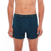 a man wearing Deep Current Men's Ridge Merino Boxer Shorts