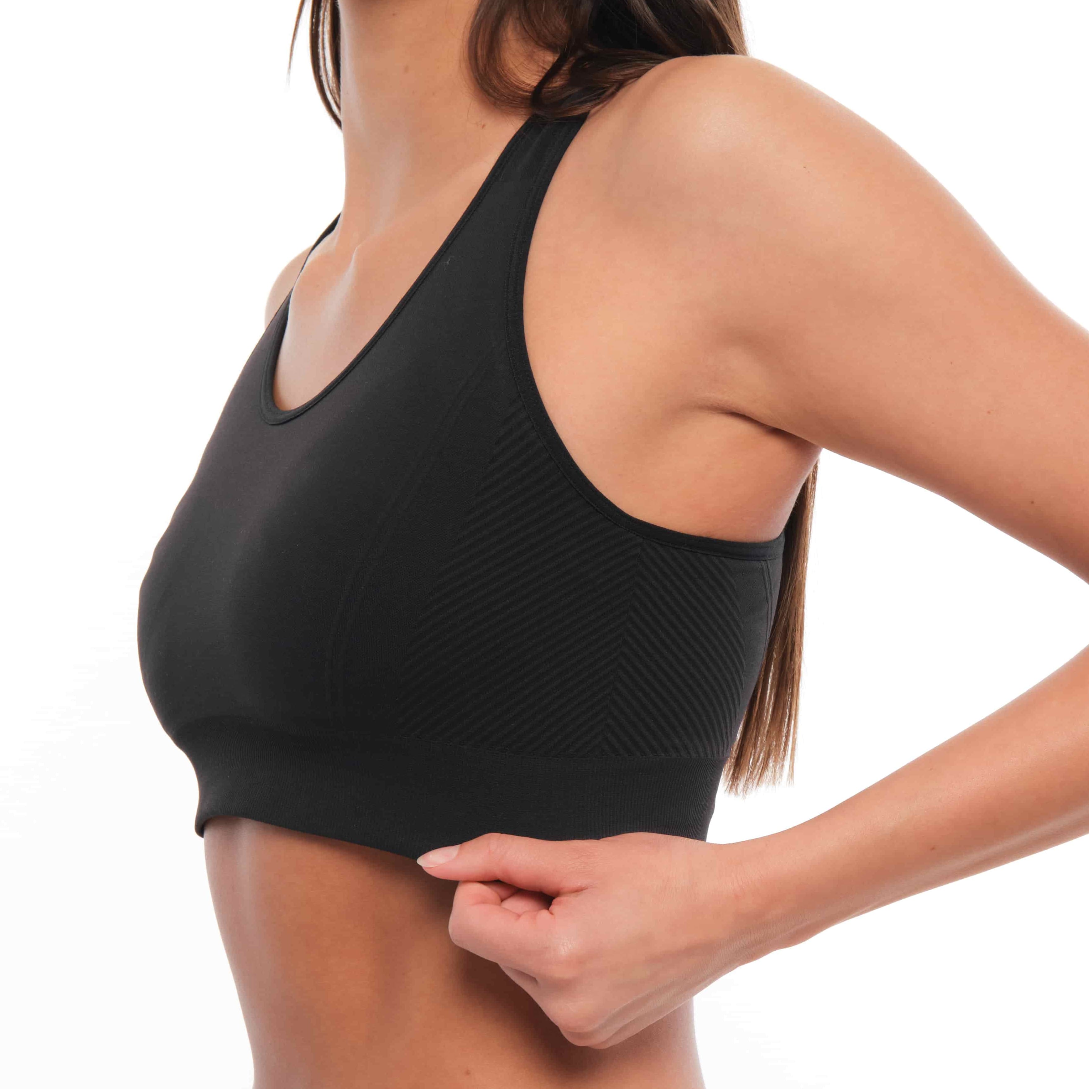 a closeup of a woman wearing a Ridge Merino Wool Sports Bra