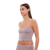 a woman wearing a Dusty Lilac Bralette with matching boy shorts