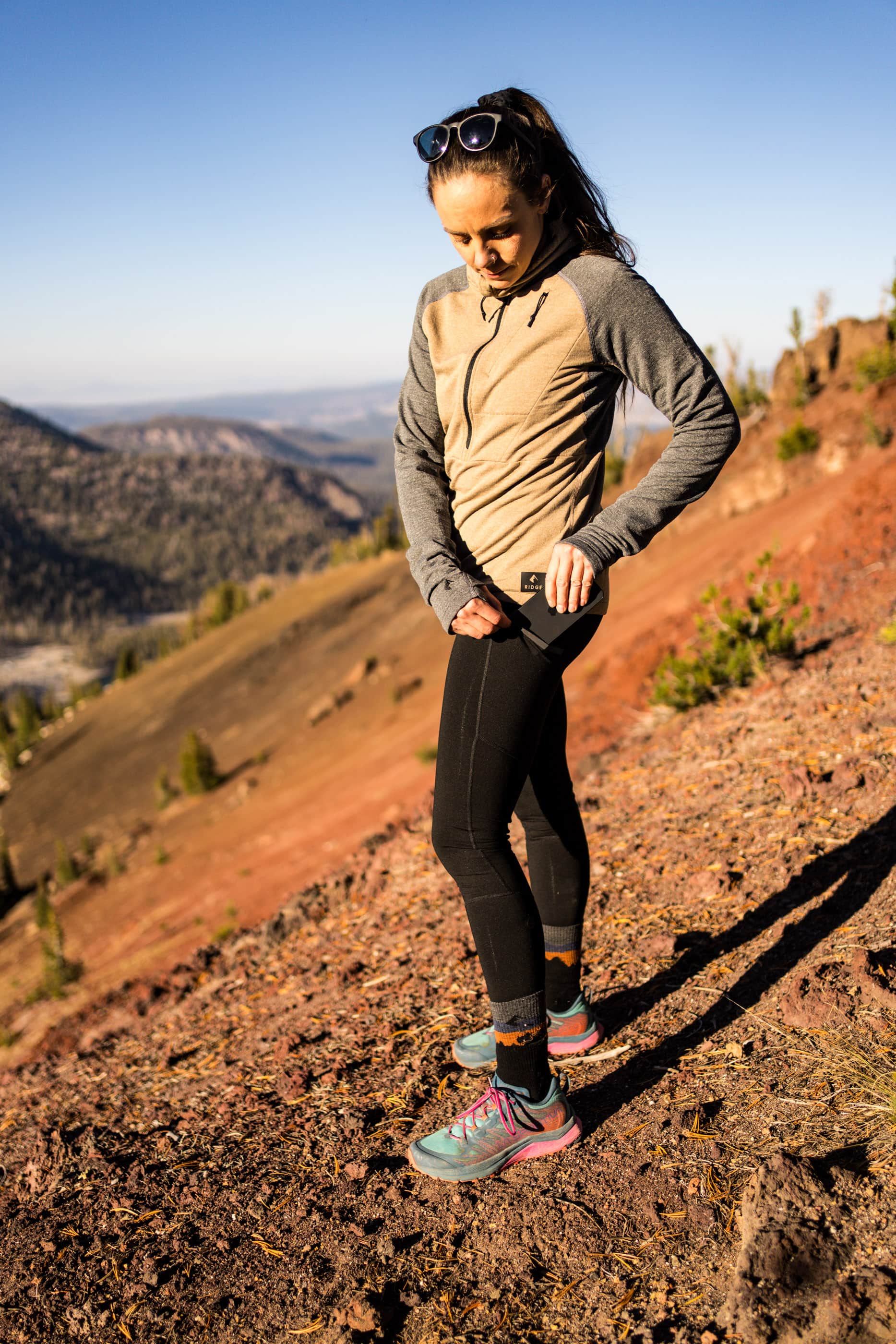 a trail runner wearing the Convict Canyon Hoodie