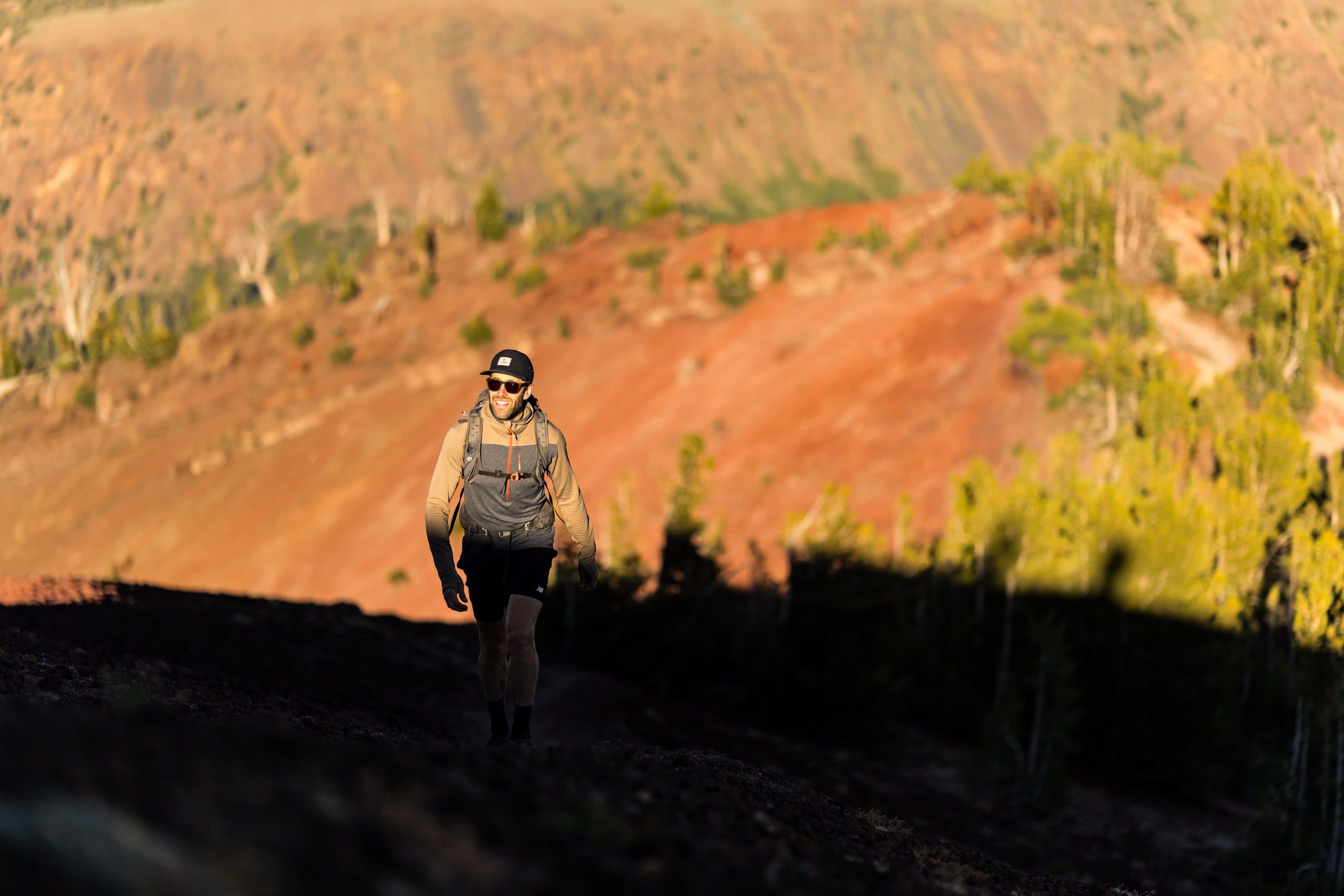 a man hiking in a Convict Canyon Hoodie