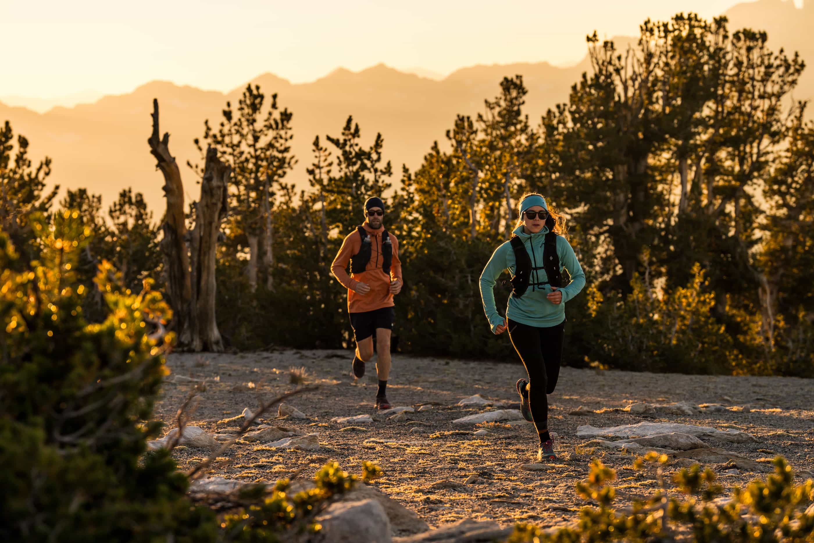 two people running in Convict Canyon Hoodies in Mammoth Lakes