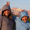 Two kids wearing Ridge Merino Solstice Hoodies
