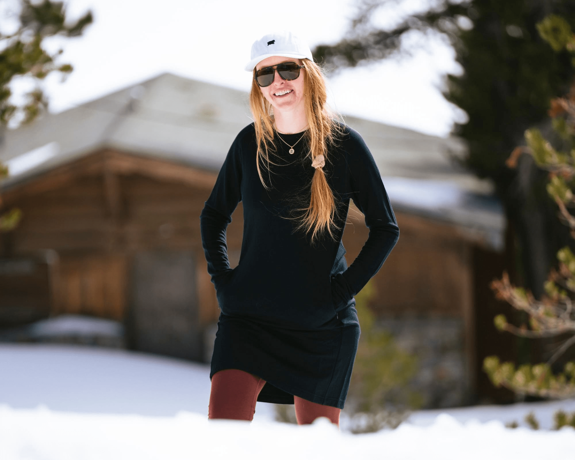 a woman walking in a Hyde Merino Wool Dress and Inversion Merino Wool Leggings