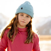 a girl wearing a Kids' Layton Merino Wool Beanie
