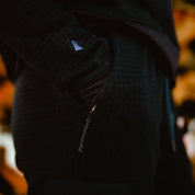 closeup of zippered hand pocket of the women's Cloudripper Merino Fleece Joggers