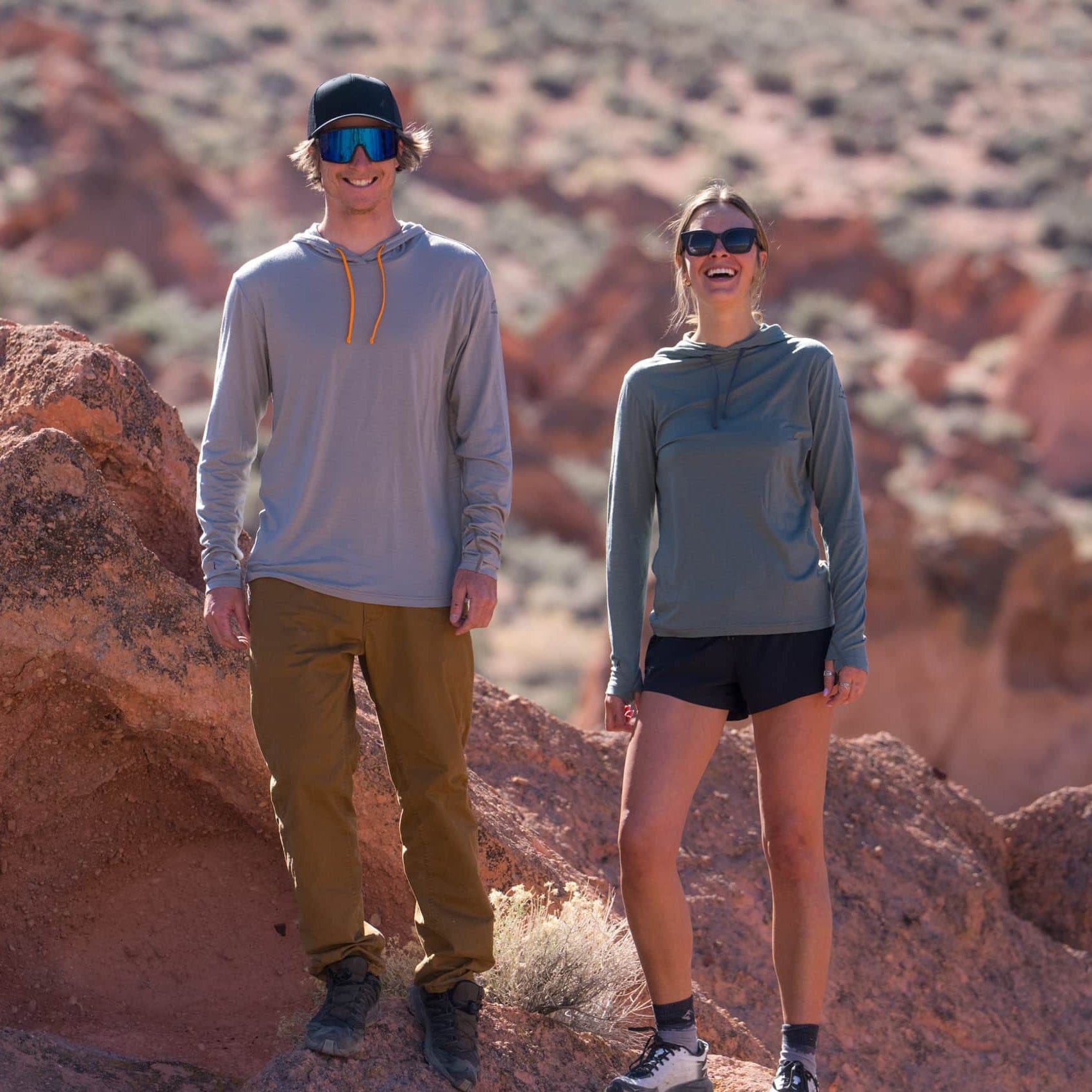 two hikers laughing wearing Ridge Merino Solstice Sun Hoodies