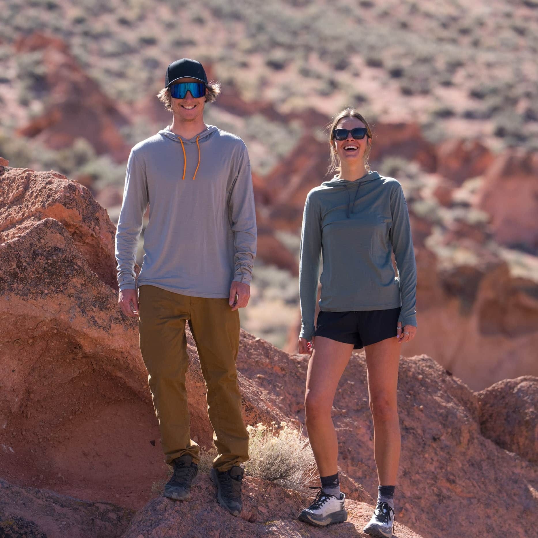 two hikers laughing wearing Ridge Merino Solstice Sun Hoodies