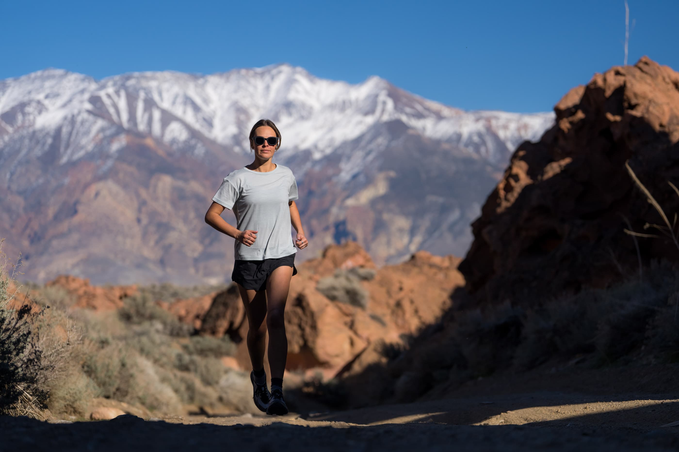 a woman running in a Journey Relaxed Fit T-shirt