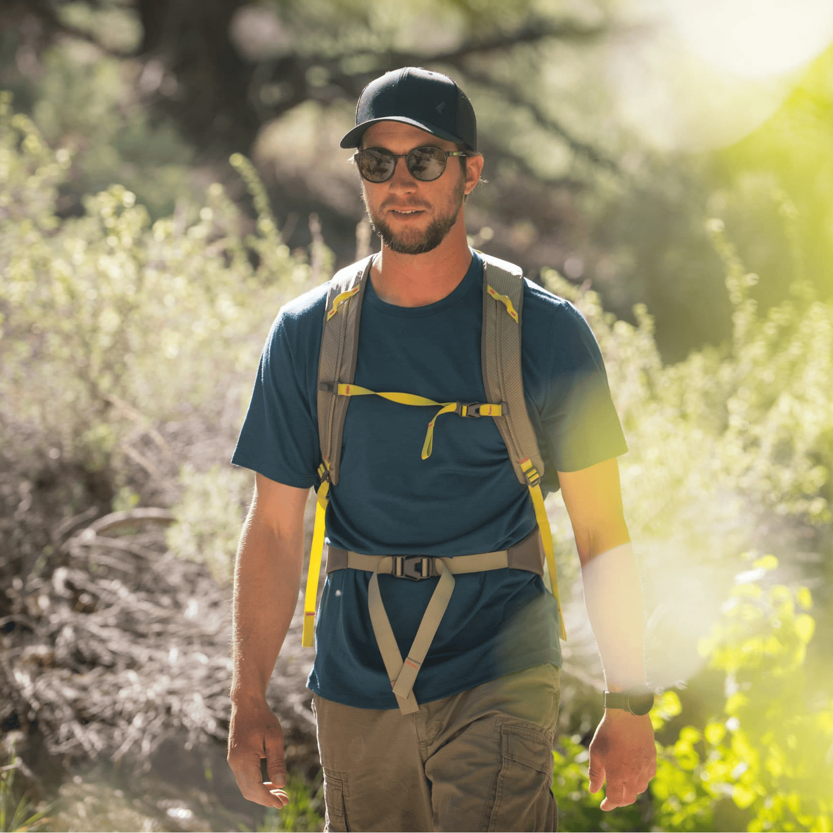 a man hiking in a Merino Wool Journey Tee