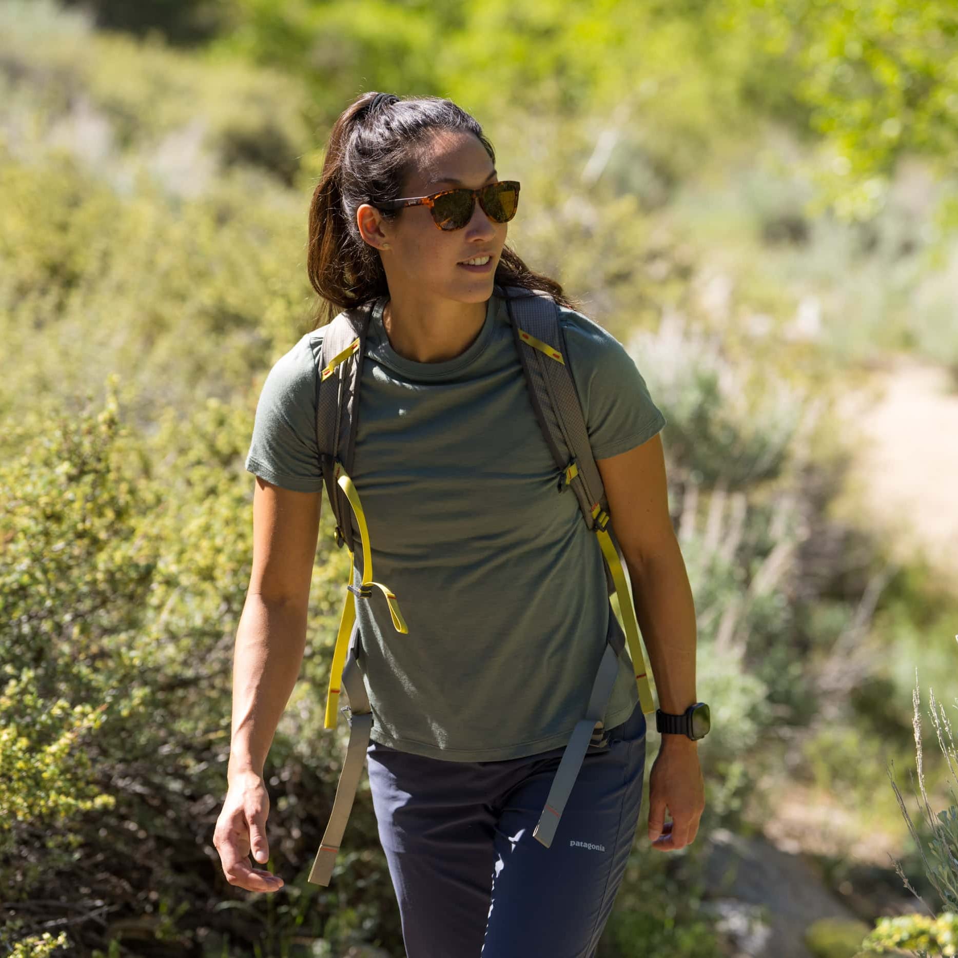 a woman hiking wearing a Journey Merino T-Shirt
