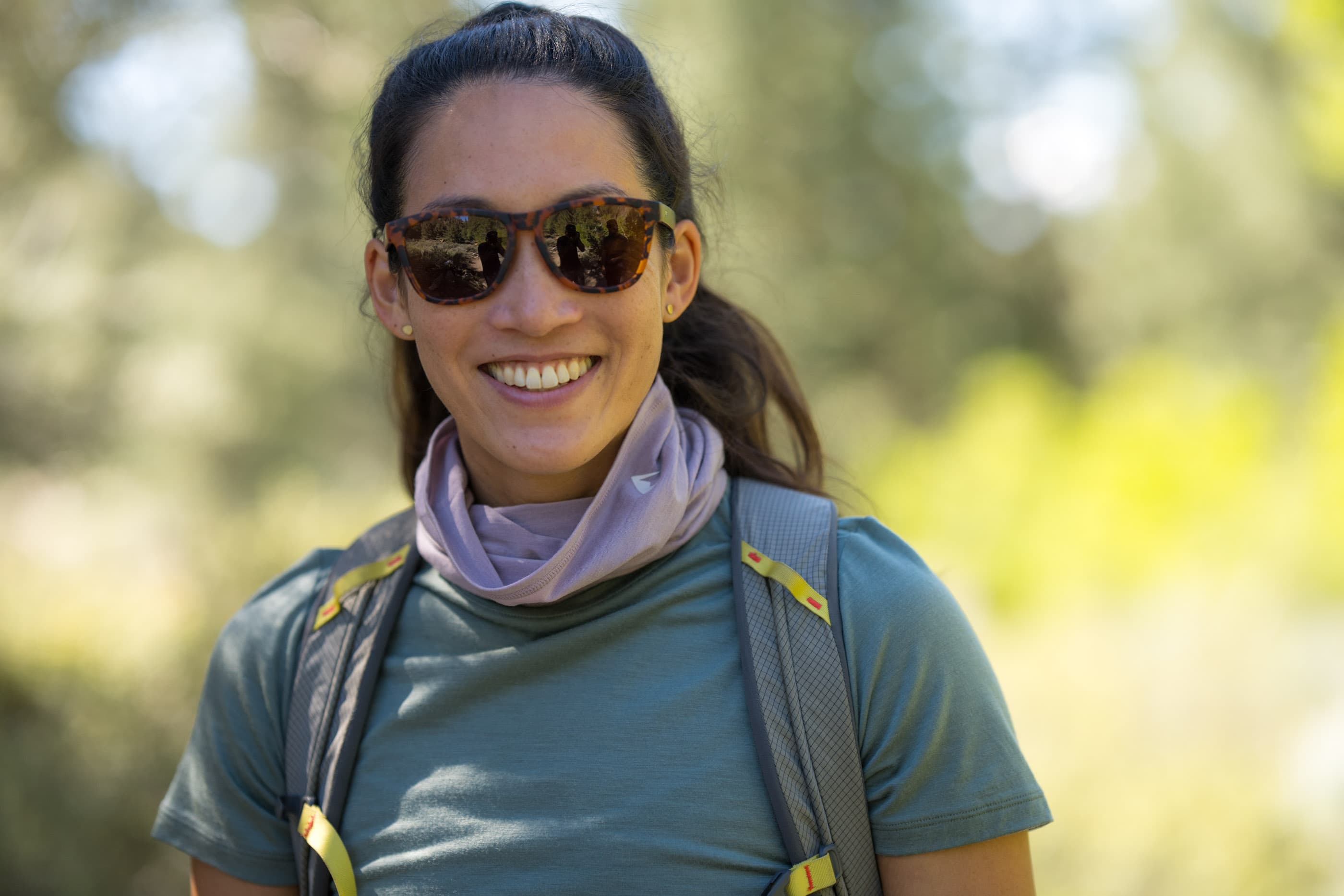 a woman wearing a Journey Tee and a pink Merino wool next tube