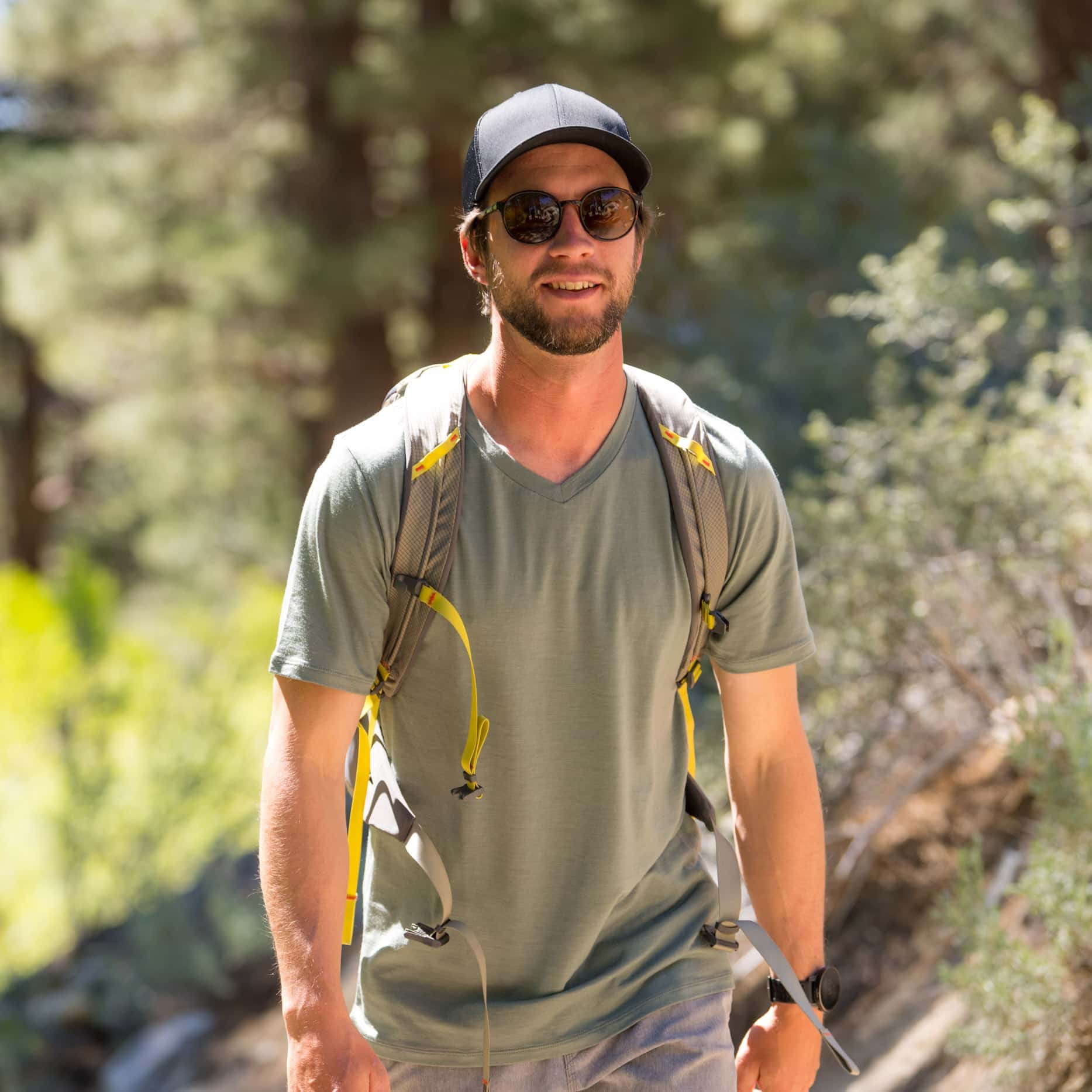 a man hiking in a Journey Merino Wool V-Neck