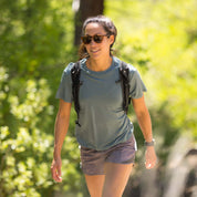 a woman hiking in a Journey Merino Wool T-Shirt