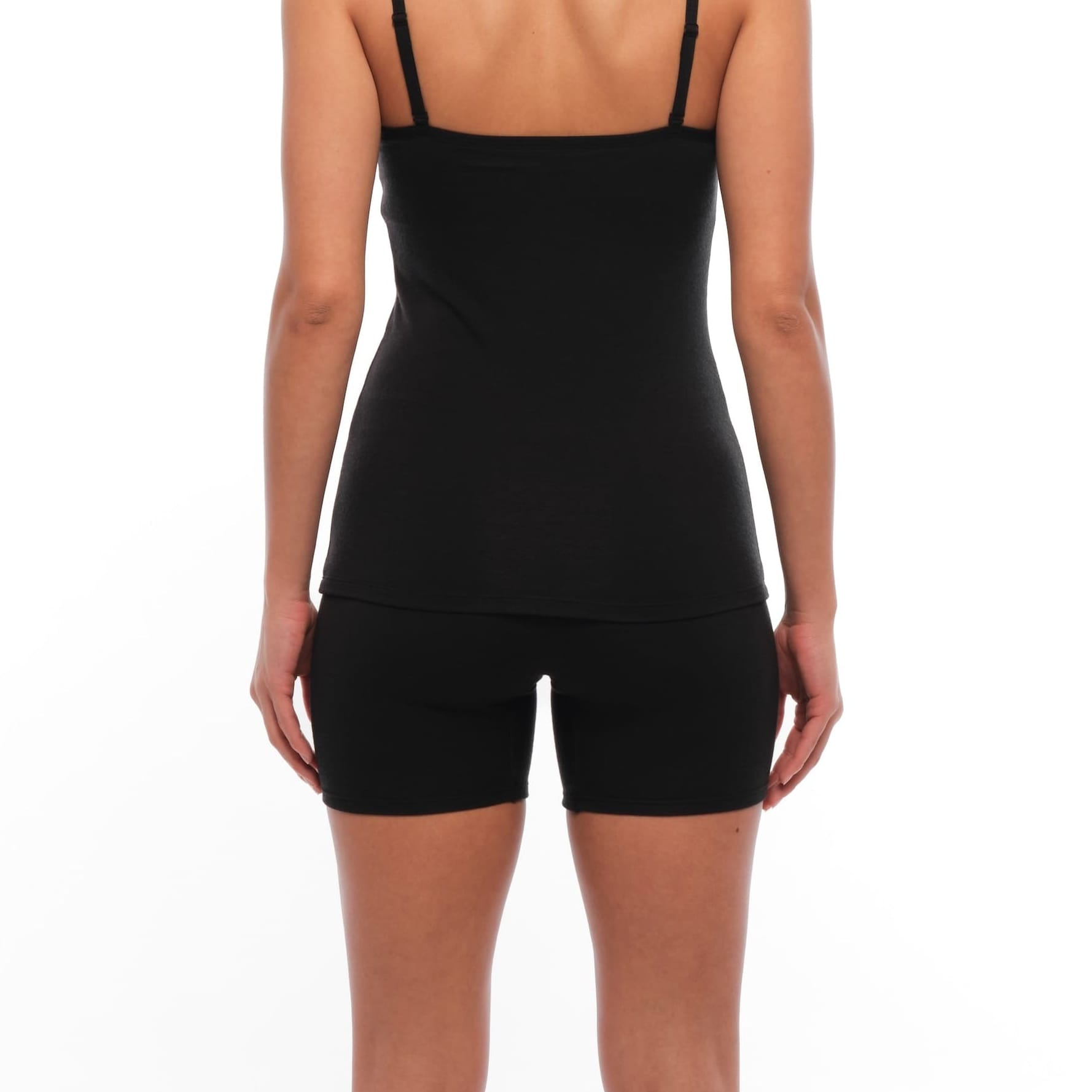 a woman wearing a Ridge Merino cami with long Boy shorts in Black
