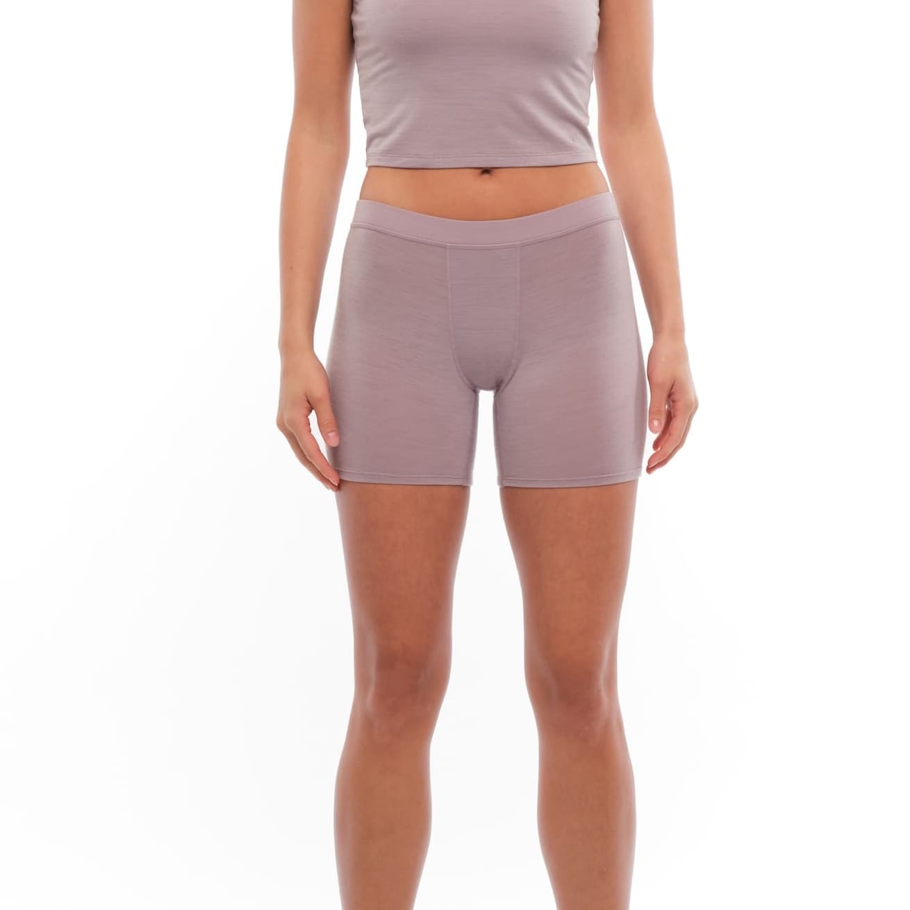 a woman wearing Dusty Lilac 5" long boy shorts with a matching Ridge Merino Bralette