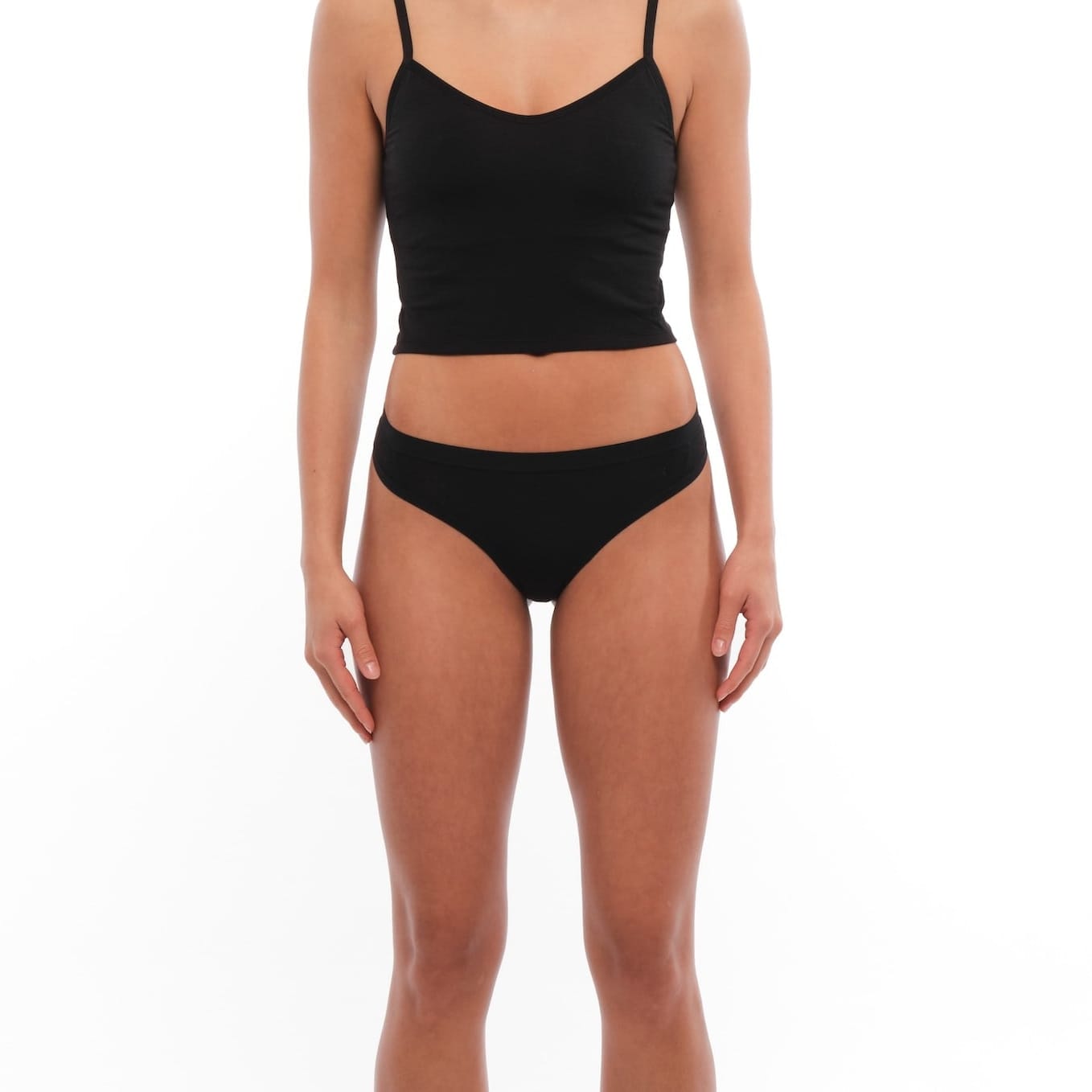 front of a black Ridge Merino thong with a matching bralette
