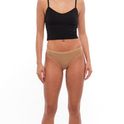 a woman wearing a Dune Ridge Merino thong with a Ridge Bralette