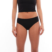 woman wearing black Merino Hipster Briefs with a matching bralette