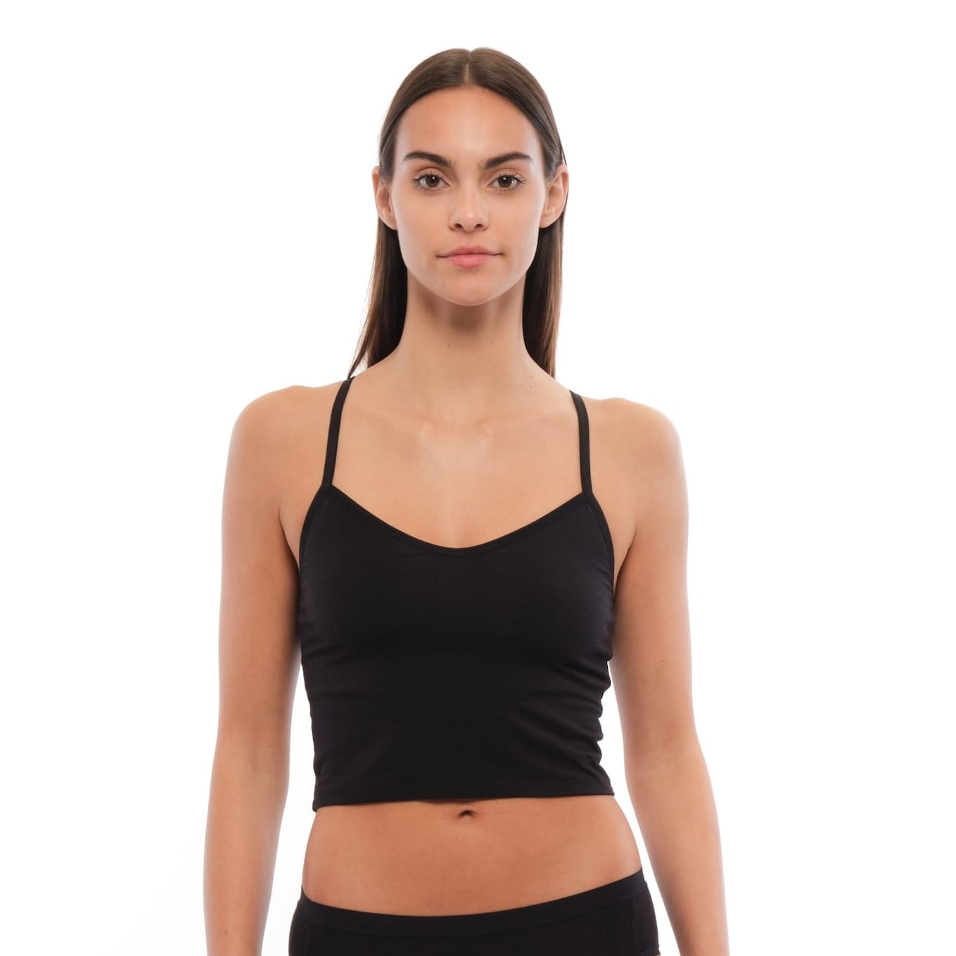 a woman wearing a black Merino wool bralette with matching hipster briefs
