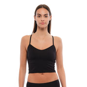a woman wearing a black Merino wool bralette with matching hipster briefs
