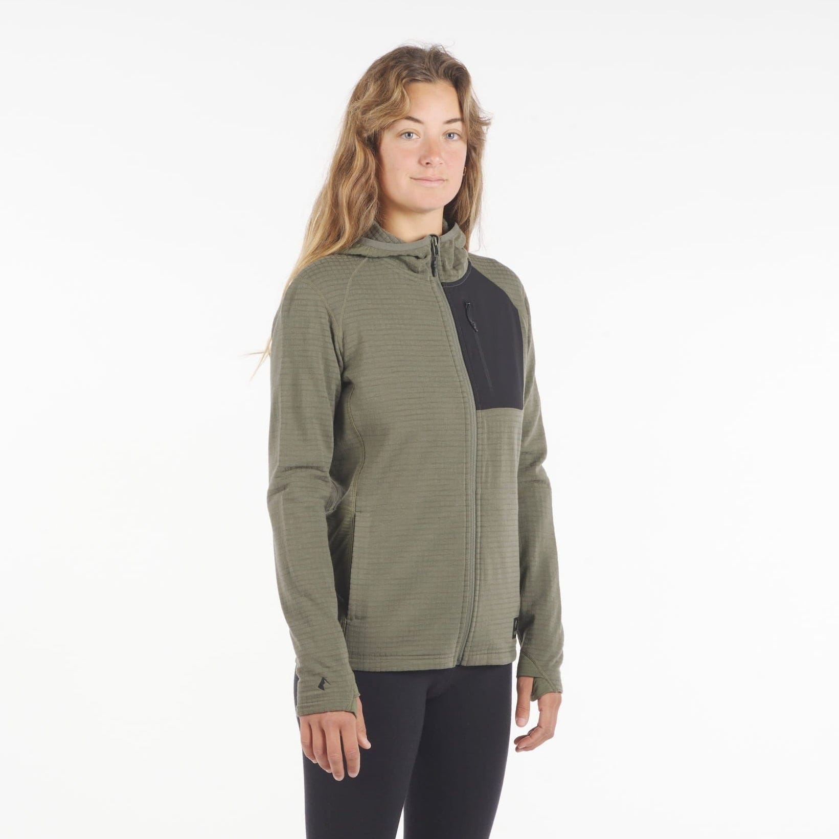a woman wearing a Cloudripper Full Zip Hoodie in surplus green from the side